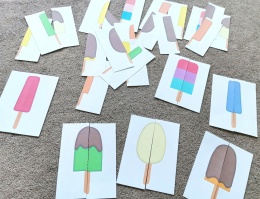 Wydrukowane puzzle dwuelementowe z motywem lodów, częściowo ułożone